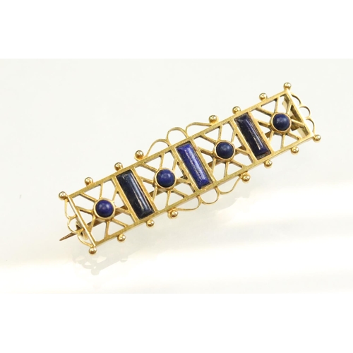 49 - Victorian lapis lazuli yellow metal brooch, three rectangular cabochon cut and four round cabochon c... 