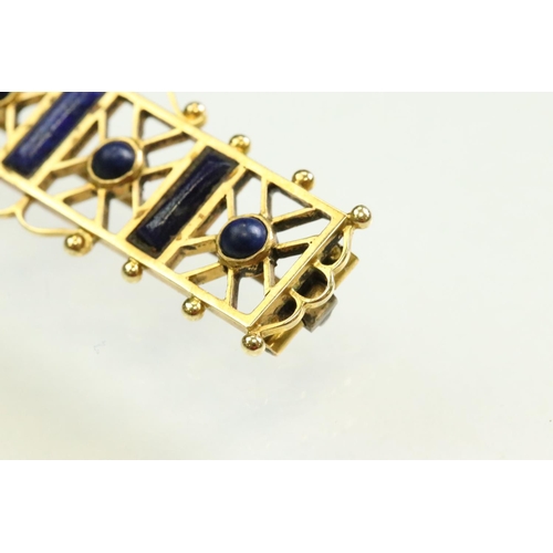 49 - Victorian lapis lazuli yellow metal brooch, three rectangular cabochon cut and four round cabochon c... 