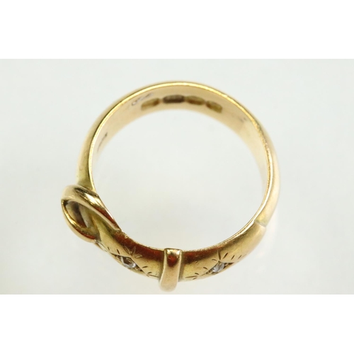 50A - Late Victorian diamond 18ct yellow gold buckle ring, two small round old eight cut diamonds, flush b... 