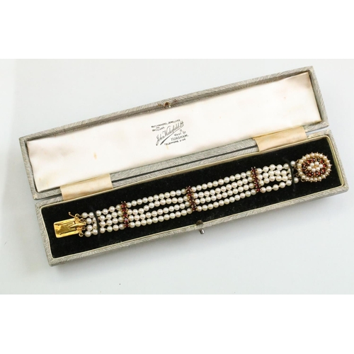 54 - Garnet and pearl 9ct yellow gold bracelet, the oval clasp set with two rows of cream cultured pearls... 