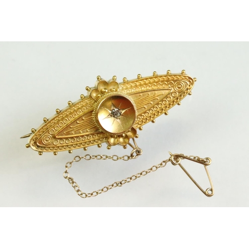 55 - Victorian Etruscan revival diamond 15ct yellow gold brooch, small old cut diamond to the centre, rop... 