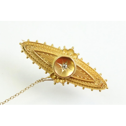 55 - Victorian Etruscan revival diamond 15ct yellow gold brooch, small old cut diamond to the centre, rop... 
