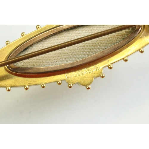 55 - Victorian Etruscan revival diamond 15ct yellow gold brooch, small old cut diamond to the centre, rop... 