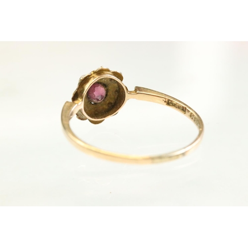 58 - Victorian garnet and pearl 9ct rose gold flower head ring,  pink-purple round mixed cut garnet to th... 