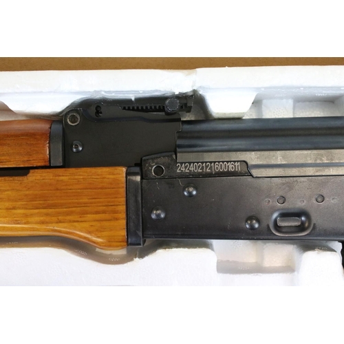 105 - A Kalashnikov AK 47 4.5mm / .177 Cal. C02 Powered BB Air Rifle, Boxed And Complete With Instructions... 