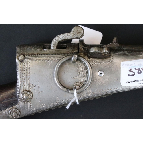 160 - An Early 19th Century Indian Matchlock Rifle With White Metal Furniture.