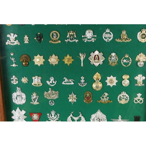 172 - A Framed A Glazed Collection Of British Staybrite Military Cap Badges To Include The Royal Artillery... 