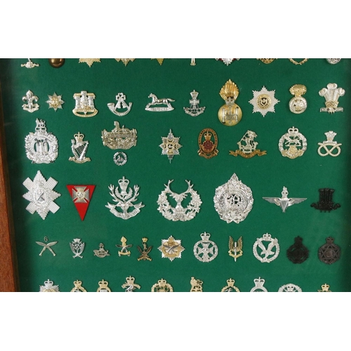 172 - A Framed A Glazed Collection Of British Staybrite Military Cap Badges To Include The Royal Artillery... 