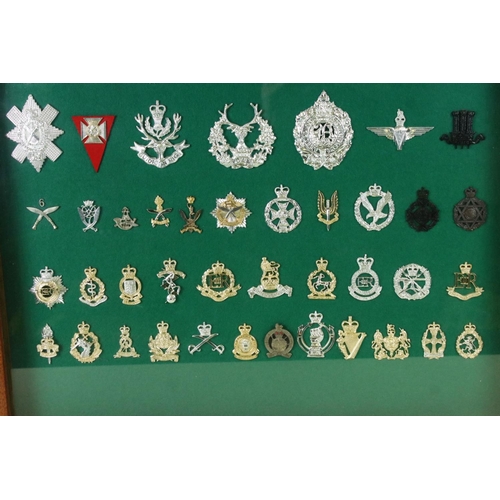 172 - A Framed A Glazed Collection Of British Staybrite Military Cap Badges To Include The Royal Artillery... 