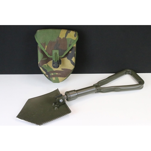 376 - A Military Folding Entrenching Tool With Camouflage Case.