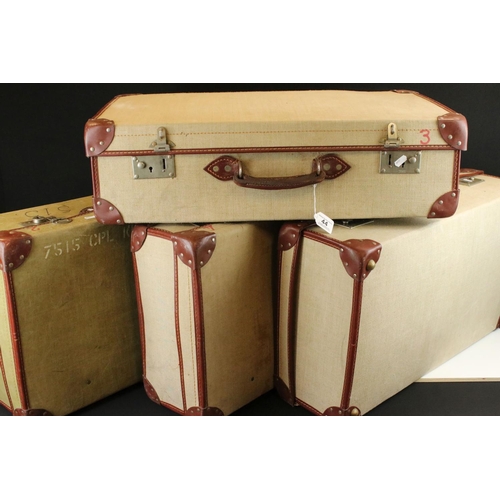 44 - A collection of four British demobilisation suitcases.