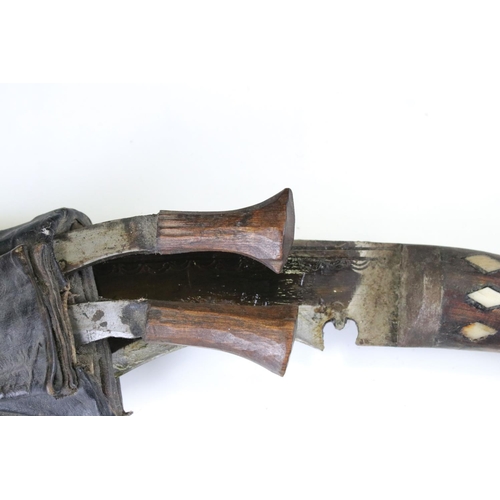 149 - A Pair Of Gurka Kukri Knives With Inlayed Wooden Grips, Complete With Original Scabbards.