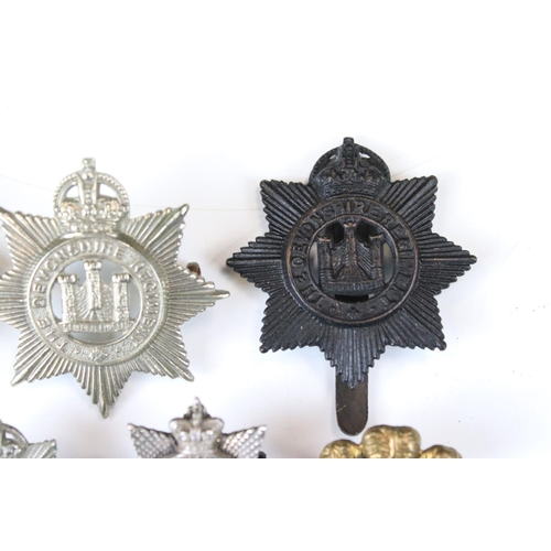 206 - A Collection Of British Military The Devonshire Regiment Cap And Collar Badges, Mainly Kings Crown E... 