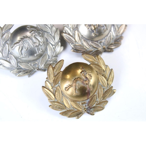 214 - A Collection Of Three British Military The Border Regiment Collar Badges, To Include Brass And White... 