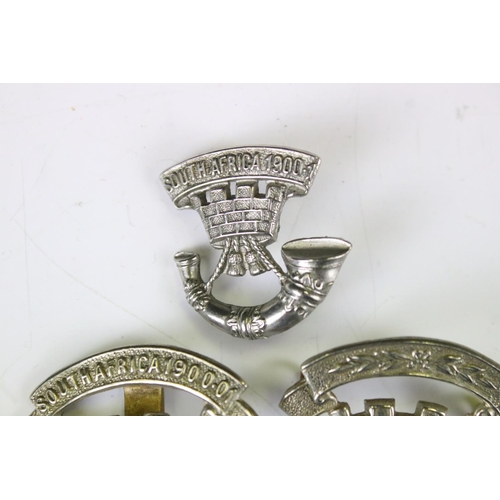 219 - A Collection Of Four Somerset Light Infantry Regiment White Metal Cap Badges, To Include South Afric... 