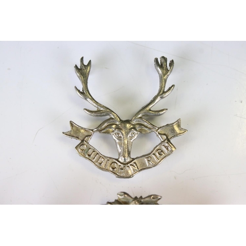 237 - A Collection Of Nine British Scottish Regimental Cap Badges To Include The Royal Scots Regiment, The... 