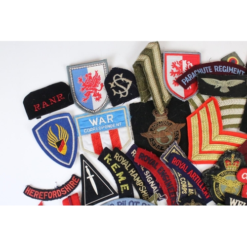 240 - A Large Collection Of Approx Sixty Mixed Military Cloth Badges, Titles...etc.