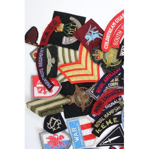 240 - A Large Collection Of Approx Sixty Mixed Military Cloth Badges, Titles...etc.