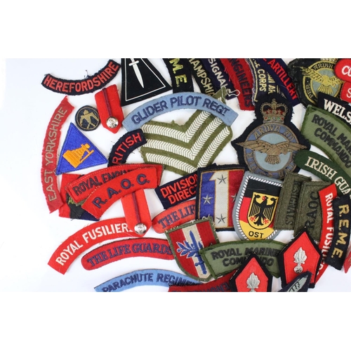 240 - A Large Collection Of Approx Sixty Mixed Military Cloth Badges, Titles...etc.