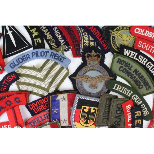 240 - A Large Collection Of Approx Sixty Mixed Military Cloth Badges, Titles...etc.