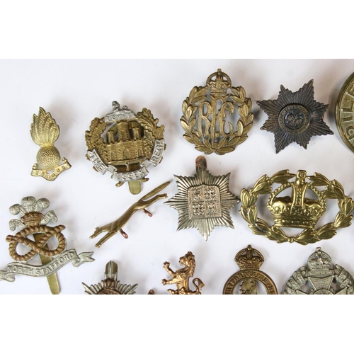 241 - A Collection Of Approx Seventy Mixed Mainly British Military Badges, Titles... etc..