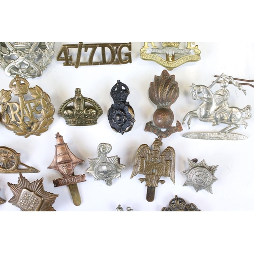 241 - A Collection Of Approx Seventy Mixed Mainly British Military Badges, Titles... etc..