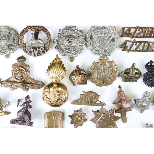 241 - A Collection Of Approx Seventy Mixed Mainly British Military Badges, Titles... etc..