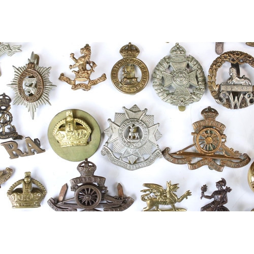 241 - A Collection Of Approx Seventy Mixed Mainly British Military Badges, Titles... etc..