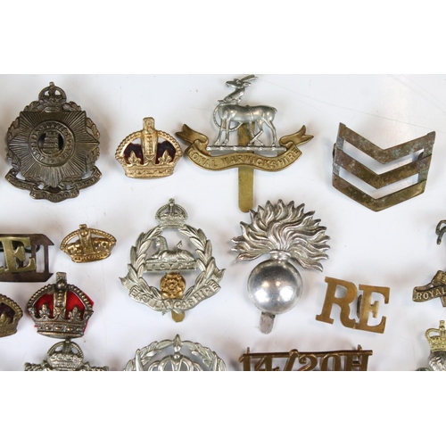 241 - A Collection Of Approx Seventy Mixed Mainly British Military Badges, Titles... etc..