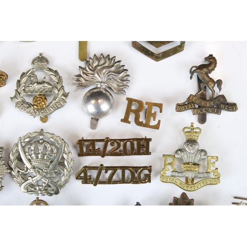 241 - A Collection Of Approx Seventy Mixed Mainly British Military Badges, Titles... etc..