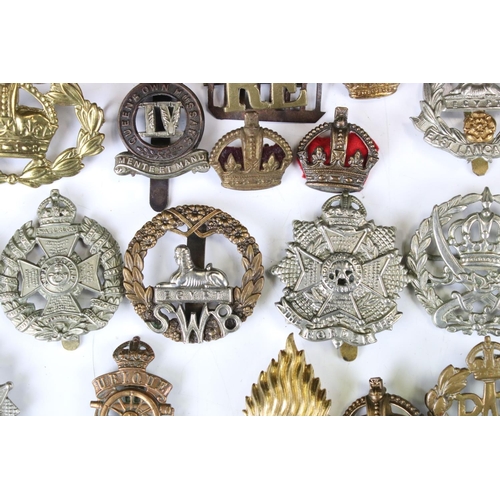 241 - A Collection Of Approx Seventy Mixed Mainly British Military Badges, Titles... etc..