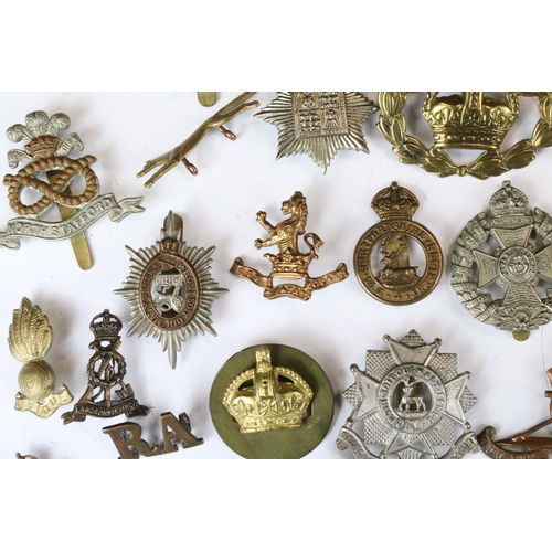 241 - A Collection Of Approx Seventy Mixed Mainly British Military Badges, Titles... etc..