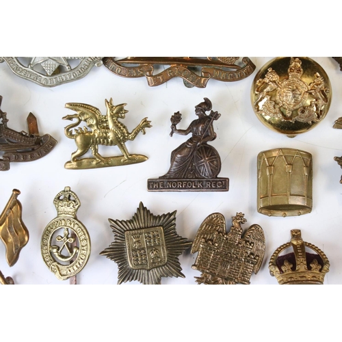 241 - A Collection Of Approx Seventy Mixed Mainly British Military Badges, Titles... etc..