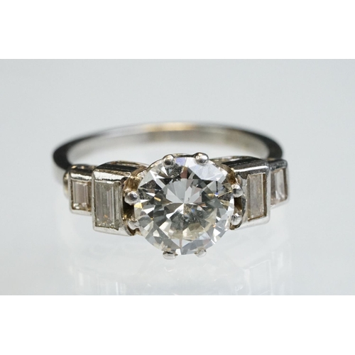 3 - Art Deco diamond platinum ring, the central round brilliant cut diamond weighing approx 1.75 carats,... 