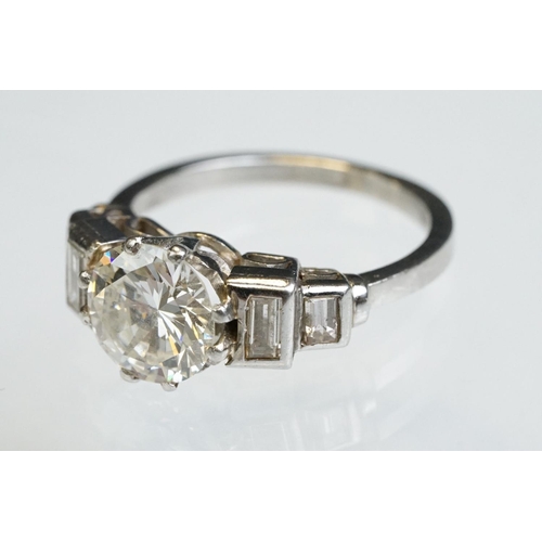 3 - Art Deco diamond platinum ring, the central round brilliant cut diamond weighing approx 1.75 carats,... 