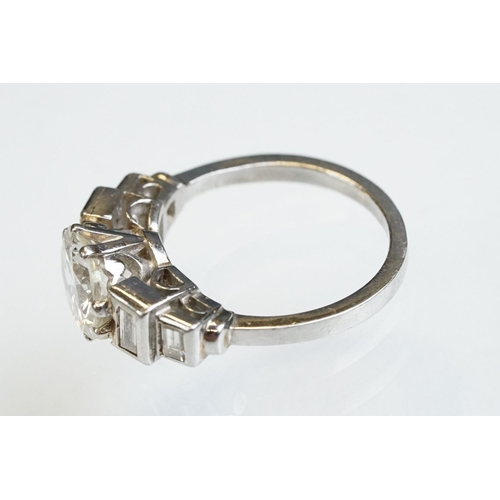 3 - Art Deco diamond platinum ring, the central round brilliant cut diamond weighing approx 1.75 carats,... 