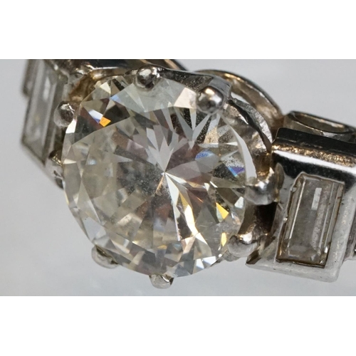 3 - Art Deco diamond platinum ring, the central round brilliant cut diamond weighing approx 1.75 carats,... 