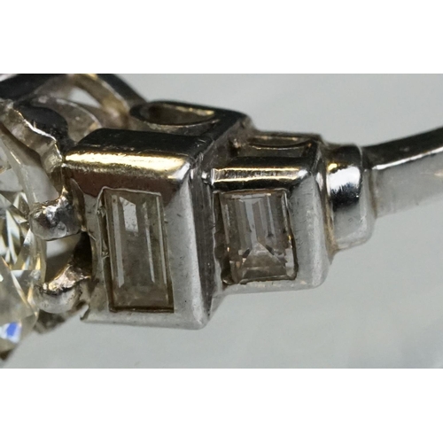 3 - Art Deco diamond platinum ring, the central round brilliant cut diamond weighing approx 1.75 carats,... 