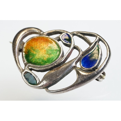 6 - Archibald Knox for Liberty & Co Cymric enamelled silver brooch, the sinuous entwined design with ora... 