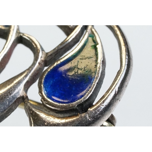 6 - Archibald Knox for Liberty & Co Cymric enamelled silver brooch, the sinuous entwined design with ora... 