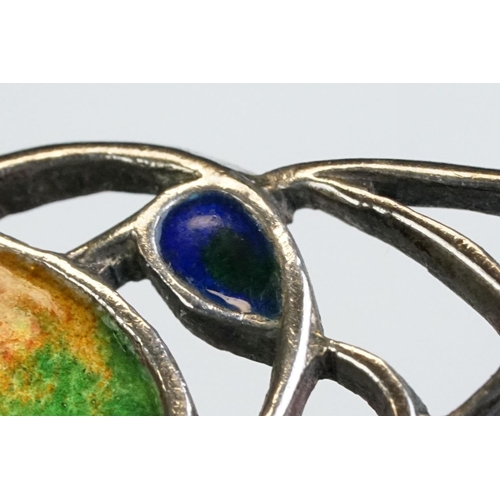 6 - Archibald Knox for Liberty & Co Cymric enamelled silver brooch, the sinuous entwined design with ora... 