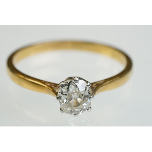 8 - Diamond solitaire 18ct yellow gold and platinum set ring, the oval cushion cut diamond weighing appr... 