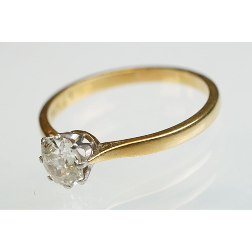 8 - Diamond solitaire 18ct yellow gold and platinum set ring, the oval cushion cut diamond weighing appr... 