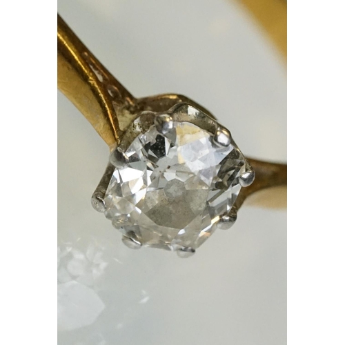 8 - Diamond solitaire 18ct yellow gold and platinum set ring, the oval cushion cut diamond weighing appr... 