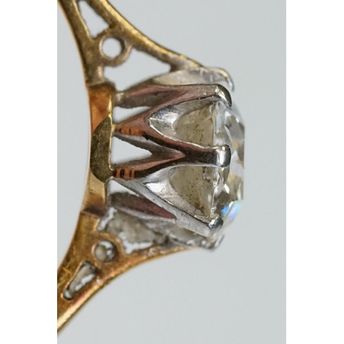 8 - Diamond solitaire 18ct yellow gold and platinum set ring, the oval cushion cut diamond weighing appr... 