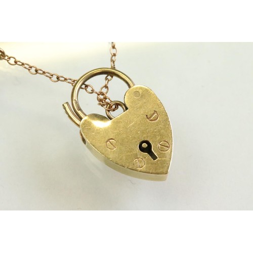 42 - 9ct yellow gold curb link bracelet, with padlock clasp and safety chain, each link stamped .375 and ... 