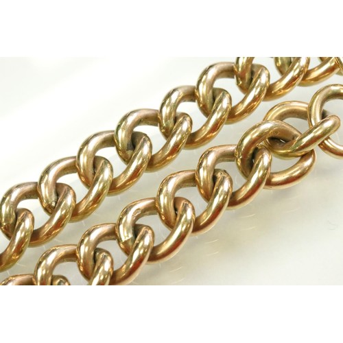42 - 9ct yellow gold curb link bracelet, with padlock clasp and safety chain, each link stamped .375 and ... 