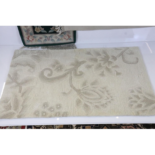 553 - Four Rugs including Marks & Spencer Cream Ground Wool Rug 81cm x 140cm, Turkish Cream Ground Wool Ru... 