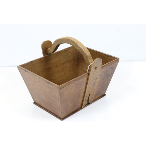 566 - Oak trug with swing handle and Army & Navy CSL label to base, 34cm long