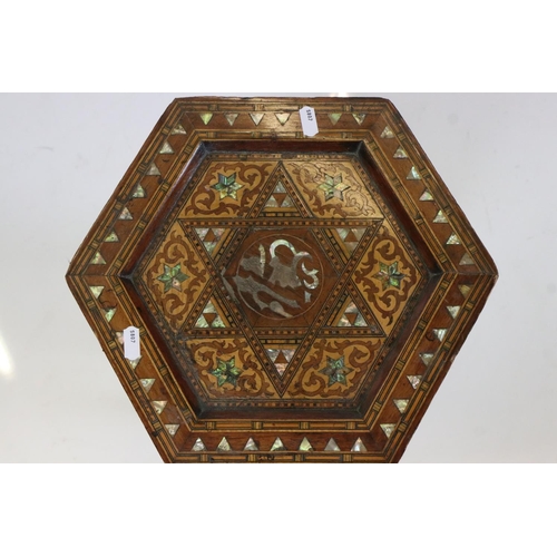 579 - Anglo-Morrish Hexagonal Table in the manner of Liberty of London, with marquetry and mother of pearl... 